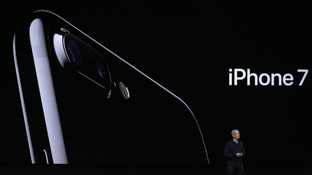 Apple CEO Tim Cook reveals the iPhone 7 in San Francisco on Wednesday.