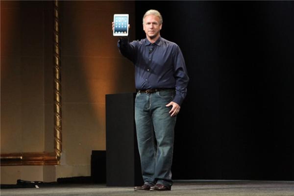 Apple executive Phil Schiller showing off the iPad Mini for the first time at the company's event in October.