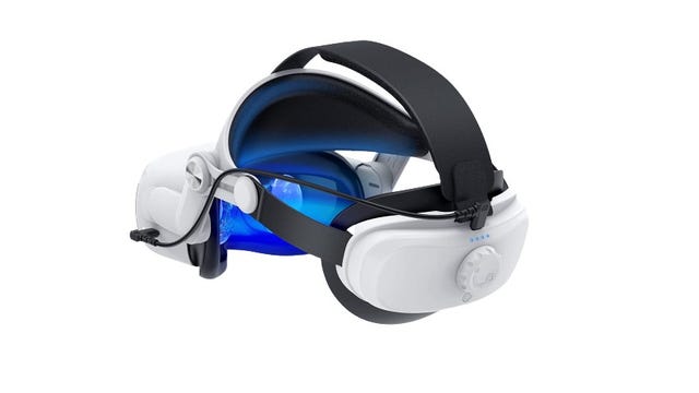 Vr headset with battery on the back and a blue light coming from the lenses