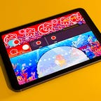 iPad Mini 6th gen on orange background