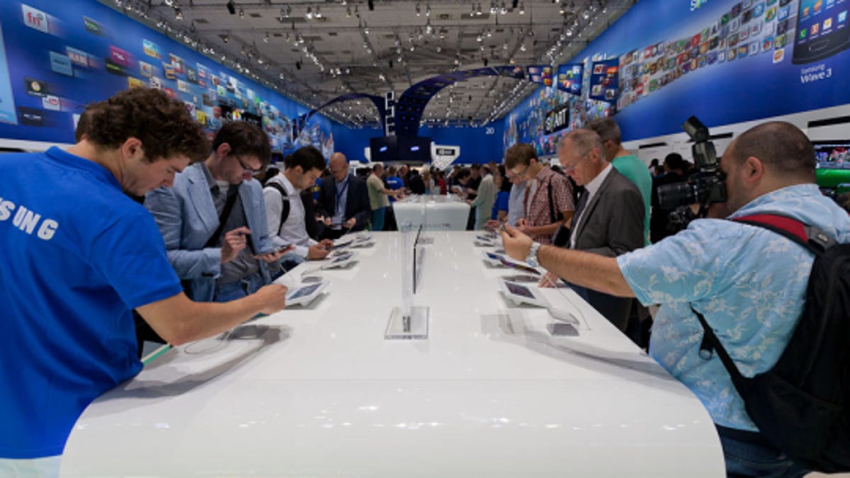 Attendees examined Samsung's Galaxy Tab 7.7 tablet at the IFA show in Berlin on Friday. The device has since been pulled from the company's booth.