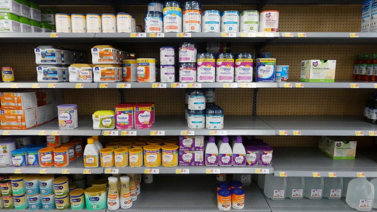 Half-empty store shelves in the baby formula aisle