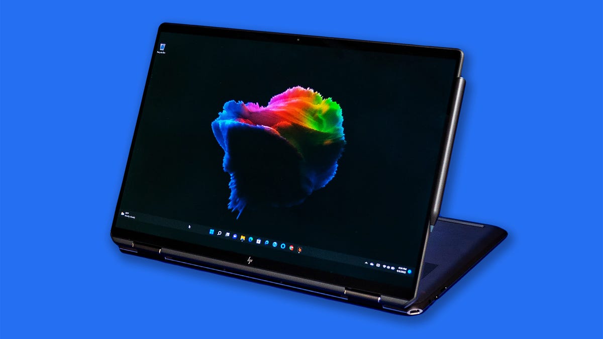 HP Spectre x360 16 on a blue background