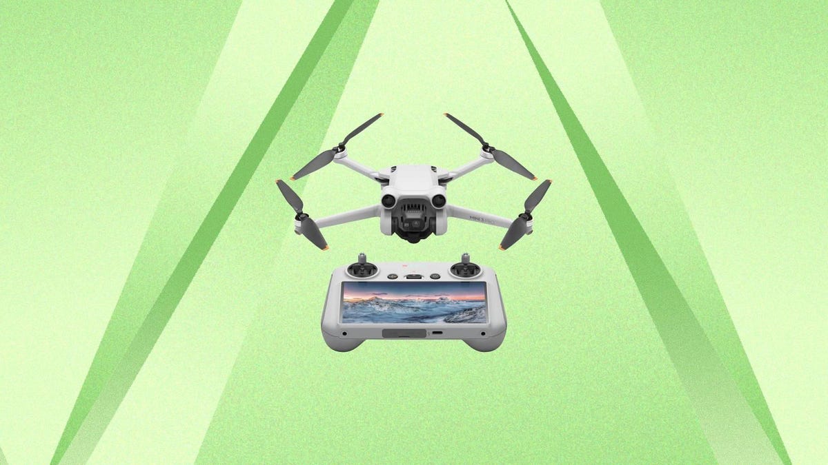 A DJI drone and controller against a green background.