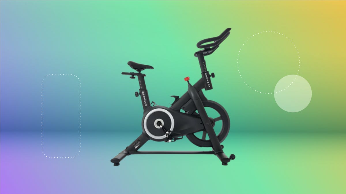 The Echelon EX-15 Smart Connect fitness bike is displayed against a gray-periwinkle background.