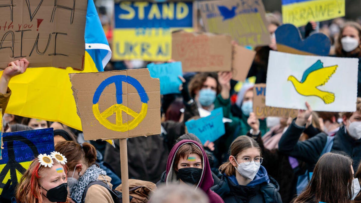 A crowd of climate activists protesting Ukraine the war in Germany