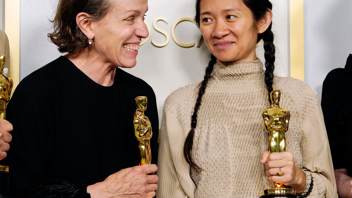 Frances McDormand and Chloe Zhao with Oscar statuettes