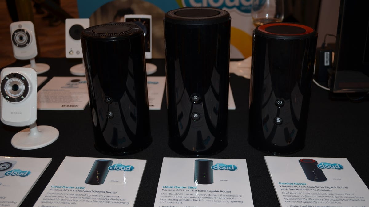 The two new 802.11ac routers, DIR-860L (left) and DIR-868L (middle), next to the all new DGL-5500 (red top) at CES 2013.