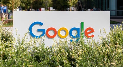 Google sign amid vegetation at the company's Mountain View, California, headquarters