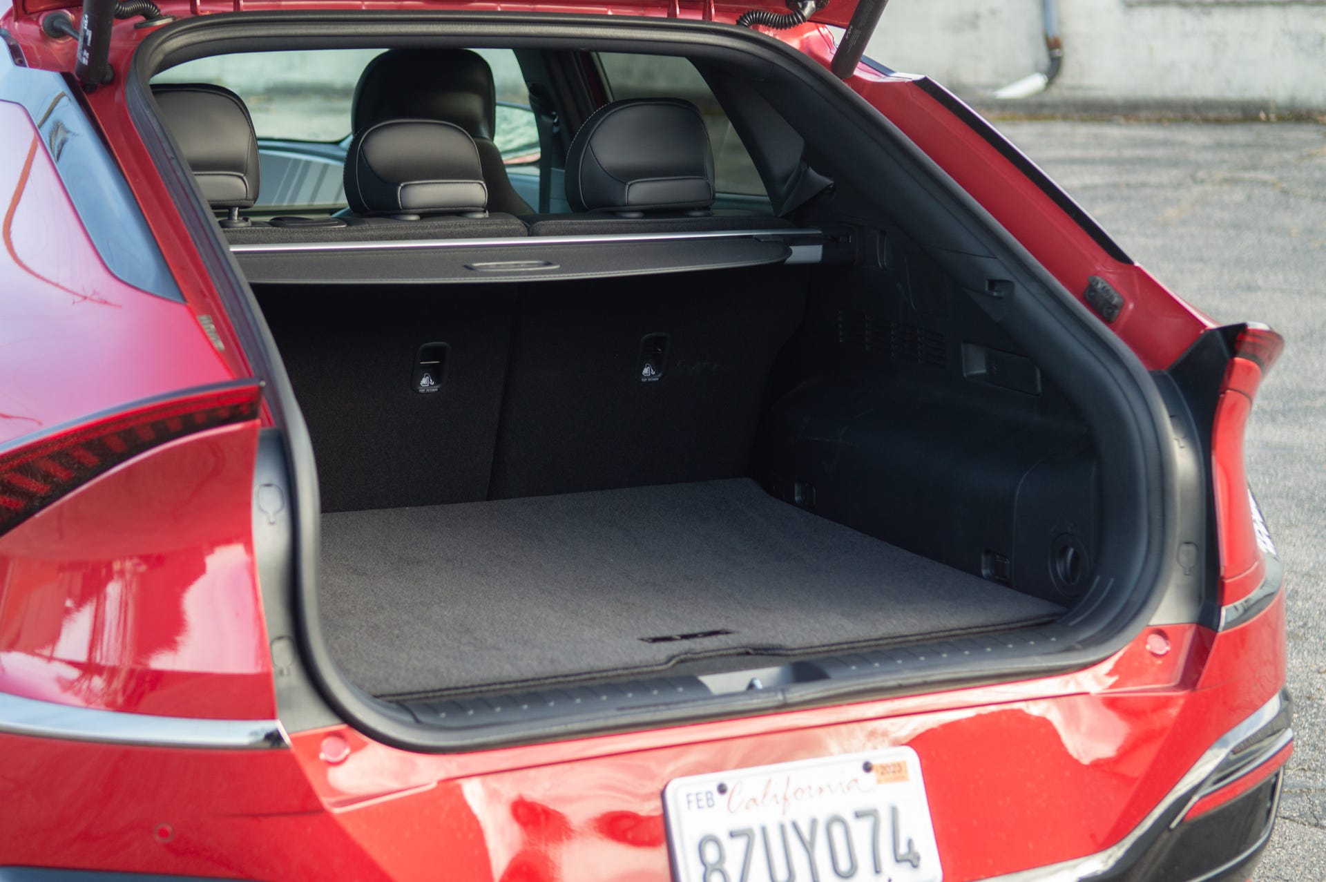 2022 Kia EV6 in red, showing off the trunk capacity