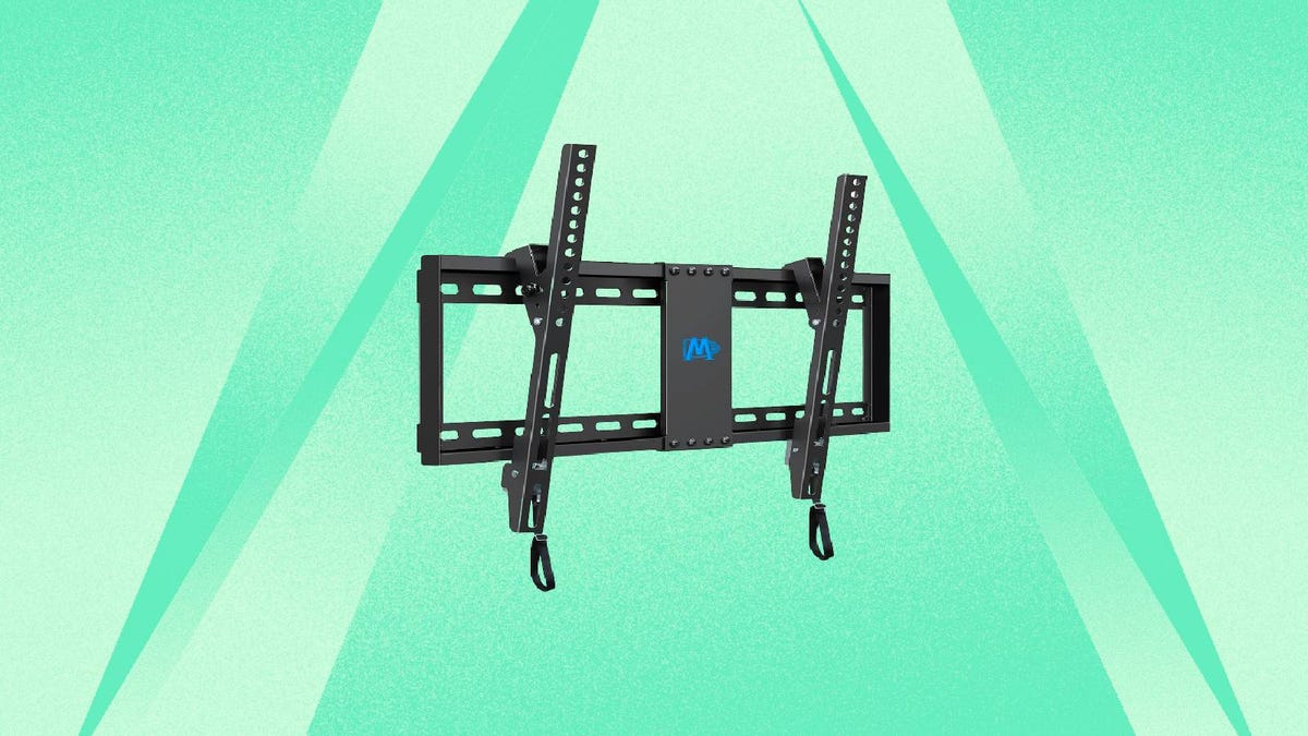 A black TV wall mount against a green background.