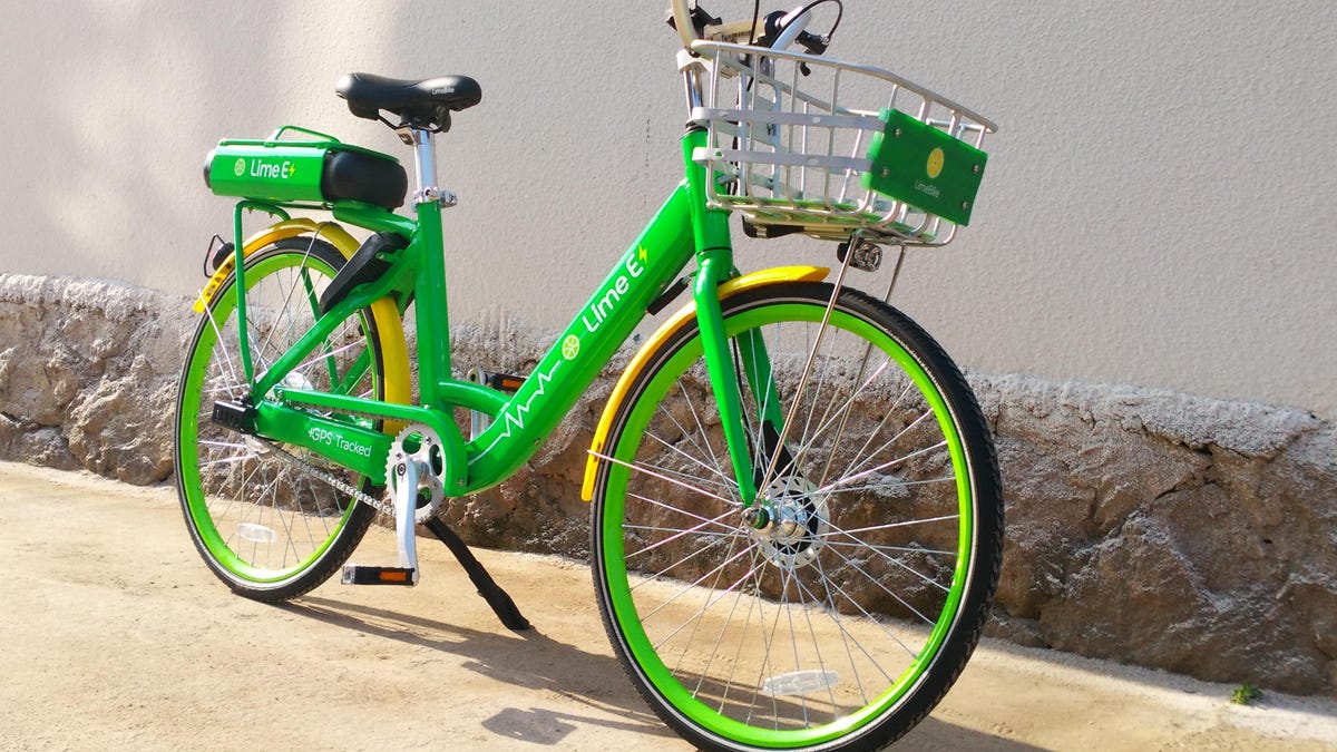 A bright green LimeBike e-assist bike