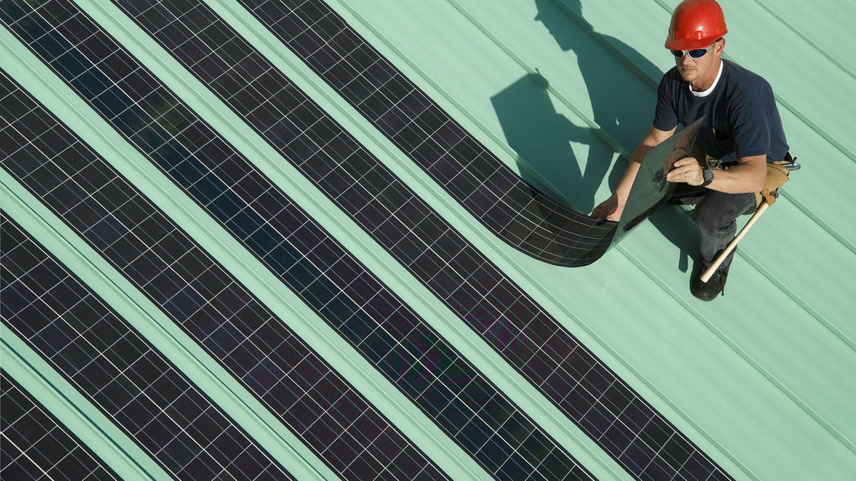 SoloPower flexible solar panels are lightweight and can be installed quickly on commercial buildings, the company says.