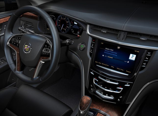 CUE stands for Cadillac User Experience.