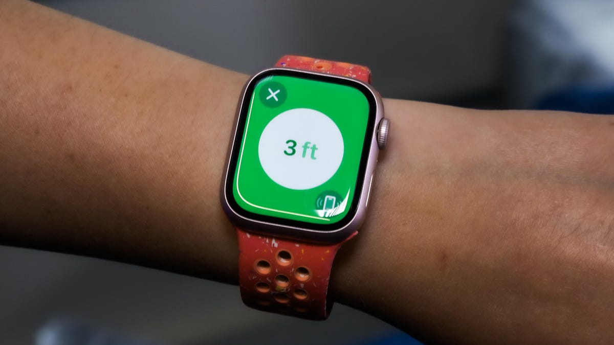 An Apple Watch Series 9 using the new Precision Finding feature on someone's wrist.