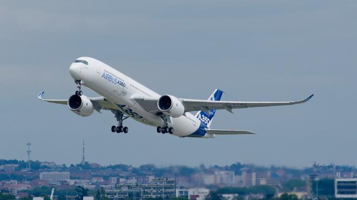 The Airbus A350 XWB, an energy-efficient new jet, takes off during its second test flight on June 19.