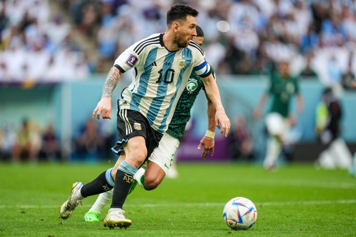 Argentina's Lionel Messi dribbles the ball in a World Cup match