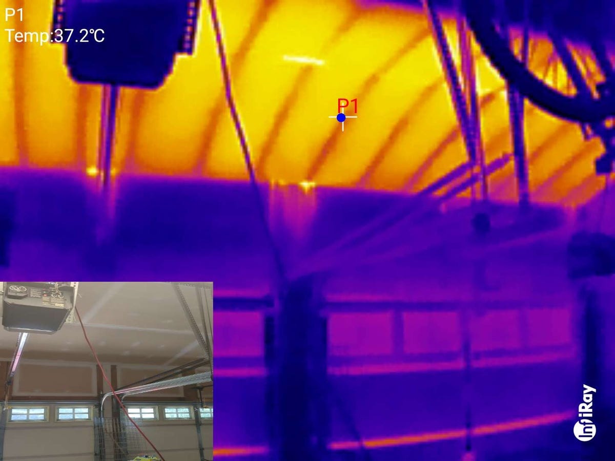 A thermal image of a garage roof that is very hot