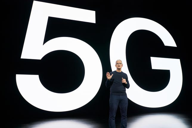 Tim Cook announcing Apple's first 5G iPhone