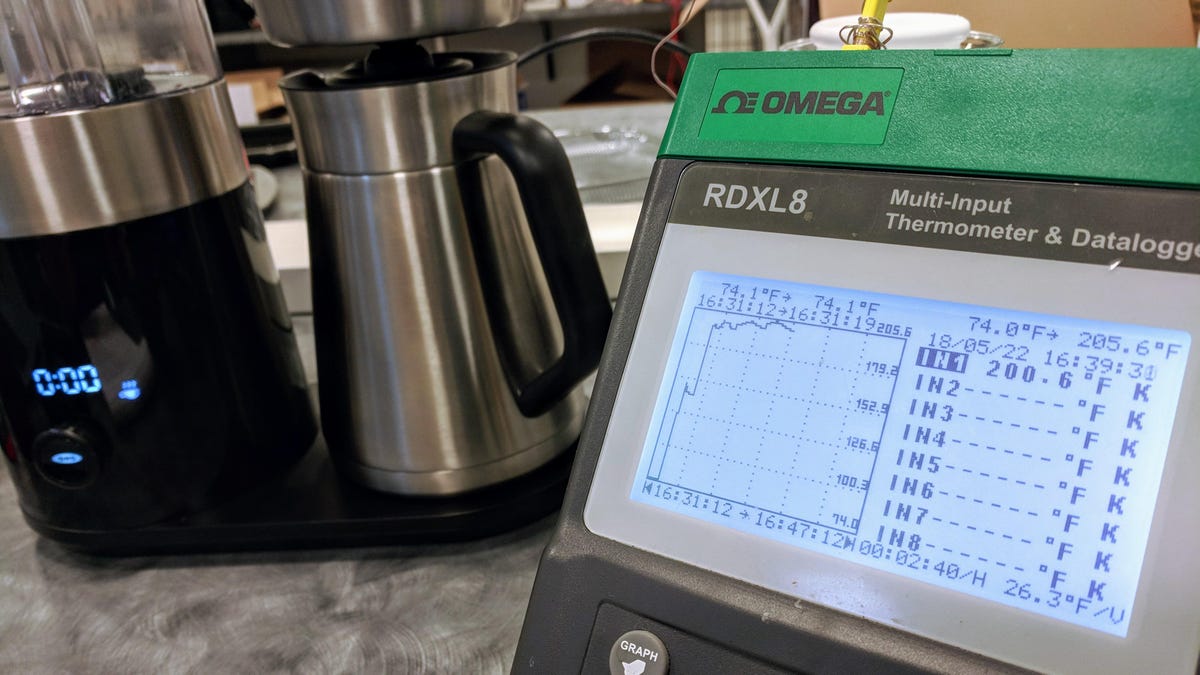 Testing a pot of coffee using an optical refractometer. 