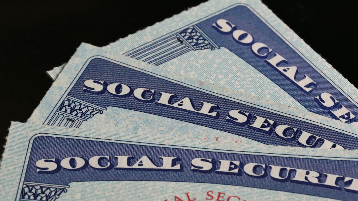 a fan of three Social Security cards