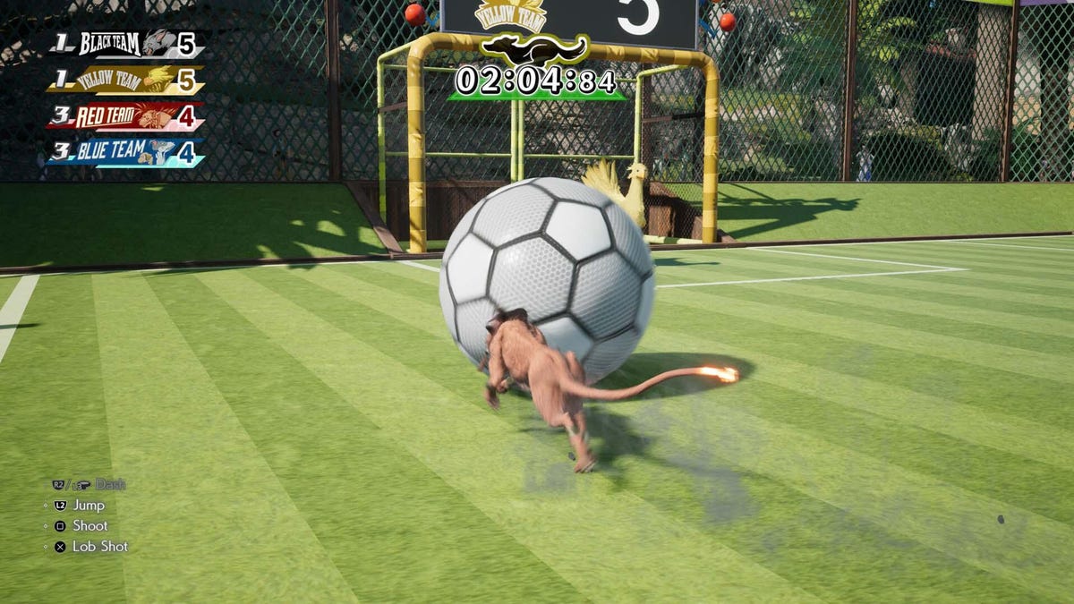 A dog-lion (Red XIII) bops around a ball on a four-way soccer field in a mini-game against other animals.
