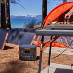 Grilling by a mountain lake powered by a Jackery solar generator