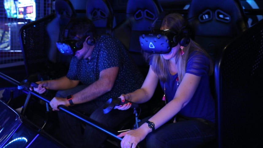 We rode the Jurassic World VR Expedition, and it's worth the 5 bucks