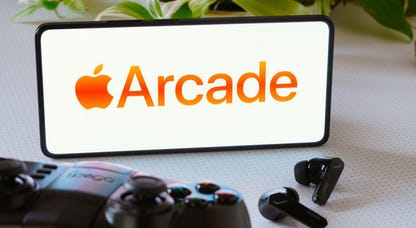 A phone showing the Apple logo and the word Arcade