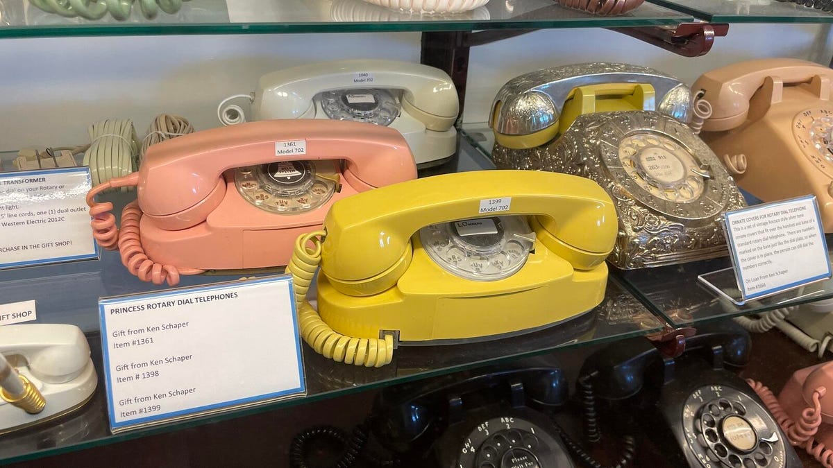 Several "Princess Phones," a colored version of the Western Electric 700 phones smaller than a loaf of bread, and thus carryable.