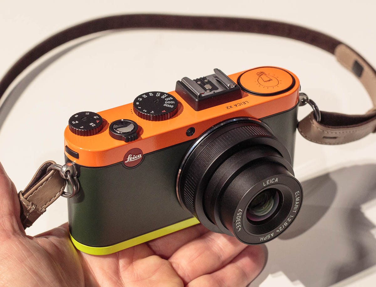 The Leica X2 Edition Paul Smith comes with green leather, an orange top, and fluorescent yellow bottom.