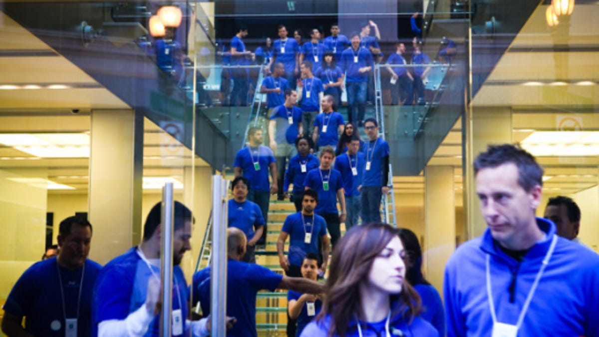A gaggle of Apple retail employees during the iPhone 4's launch last year in San Francisco.