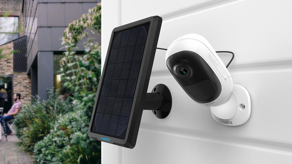 The Argus 2 security camera with solar panel mounted on a wall