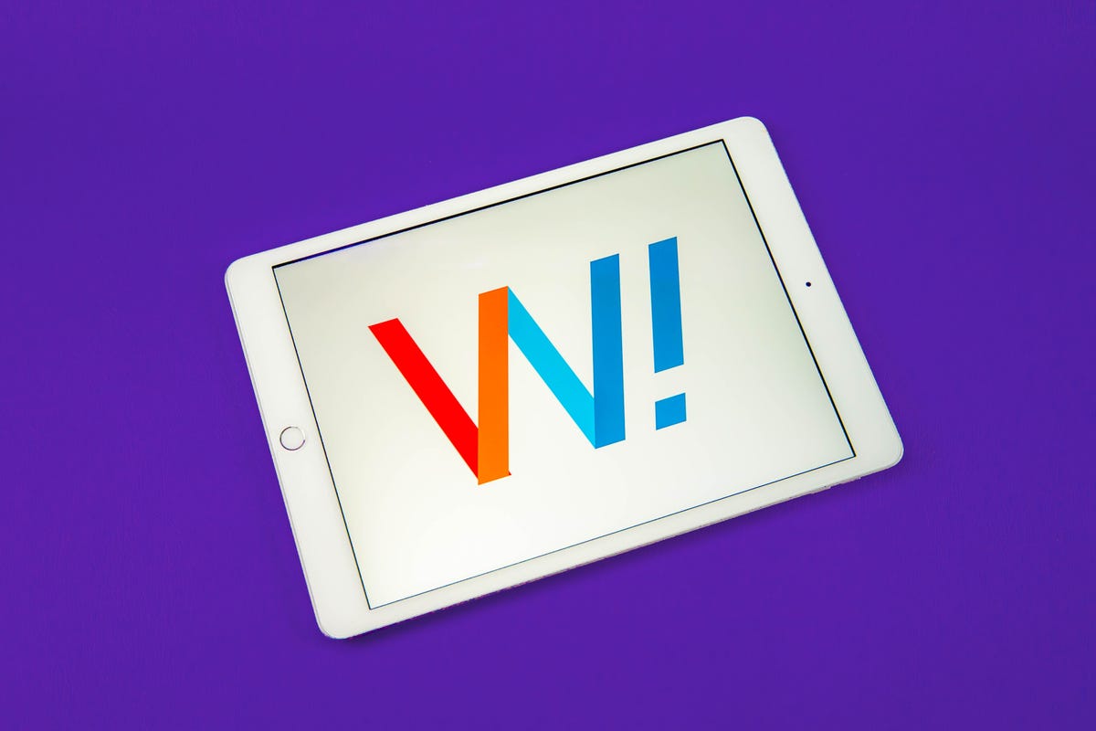 WOW logo on a tablet with a purple background