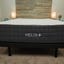 The Helix Plus Mattress in a queen size on top of a bed frame