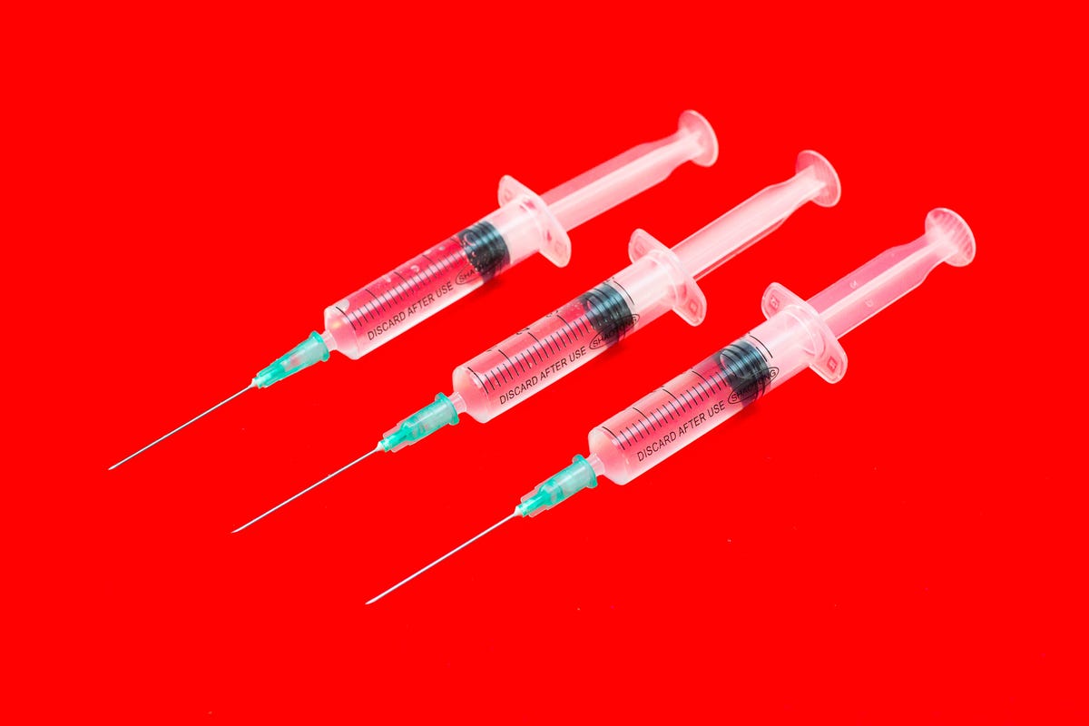 covid-19-vaccines-3rd-booster-shot-syringes-winter-2021-cnet-028