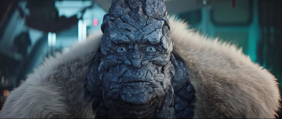 Close-up of Korg the rock monster wearing a furry coat