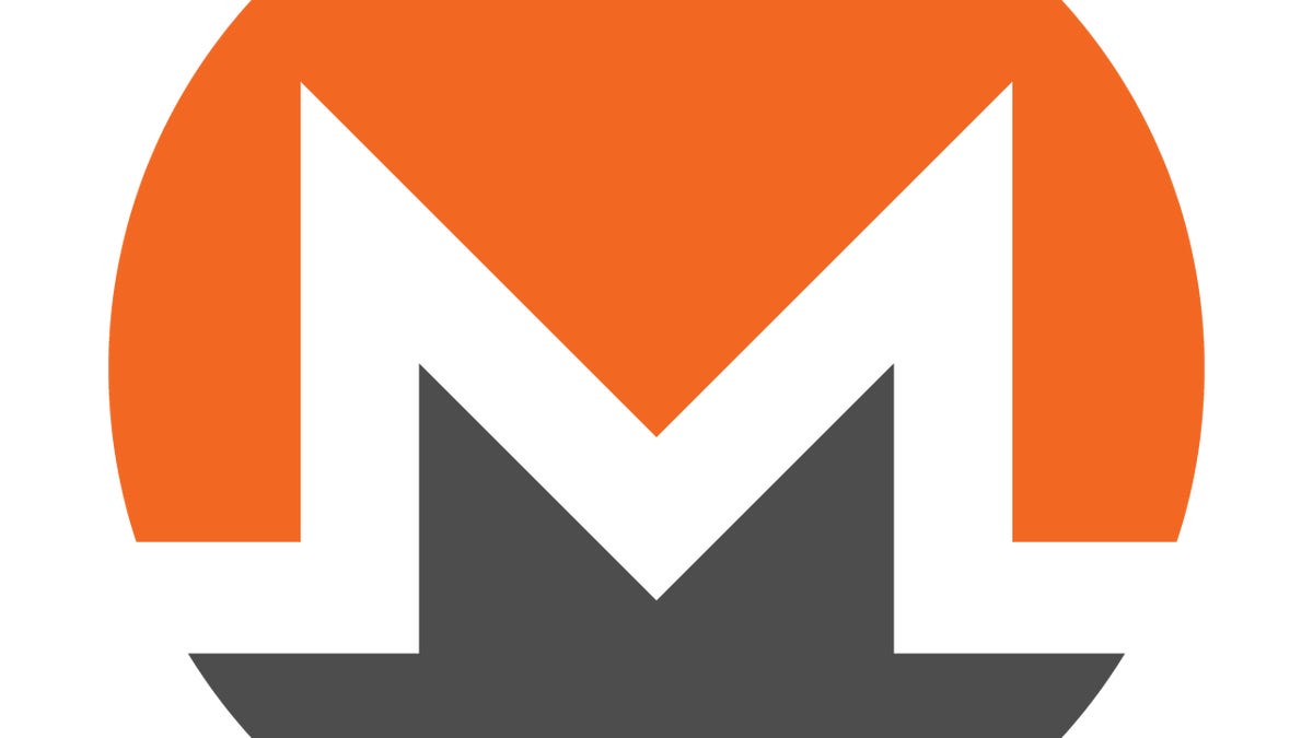 The Monero symbol -- a white, angular letter em in a circle that is orange above the em and gray below. Using a script called Coinhive, a website for fans of deepfake videos mined cryptocurrency Monero on visitors' computers, researchers found.