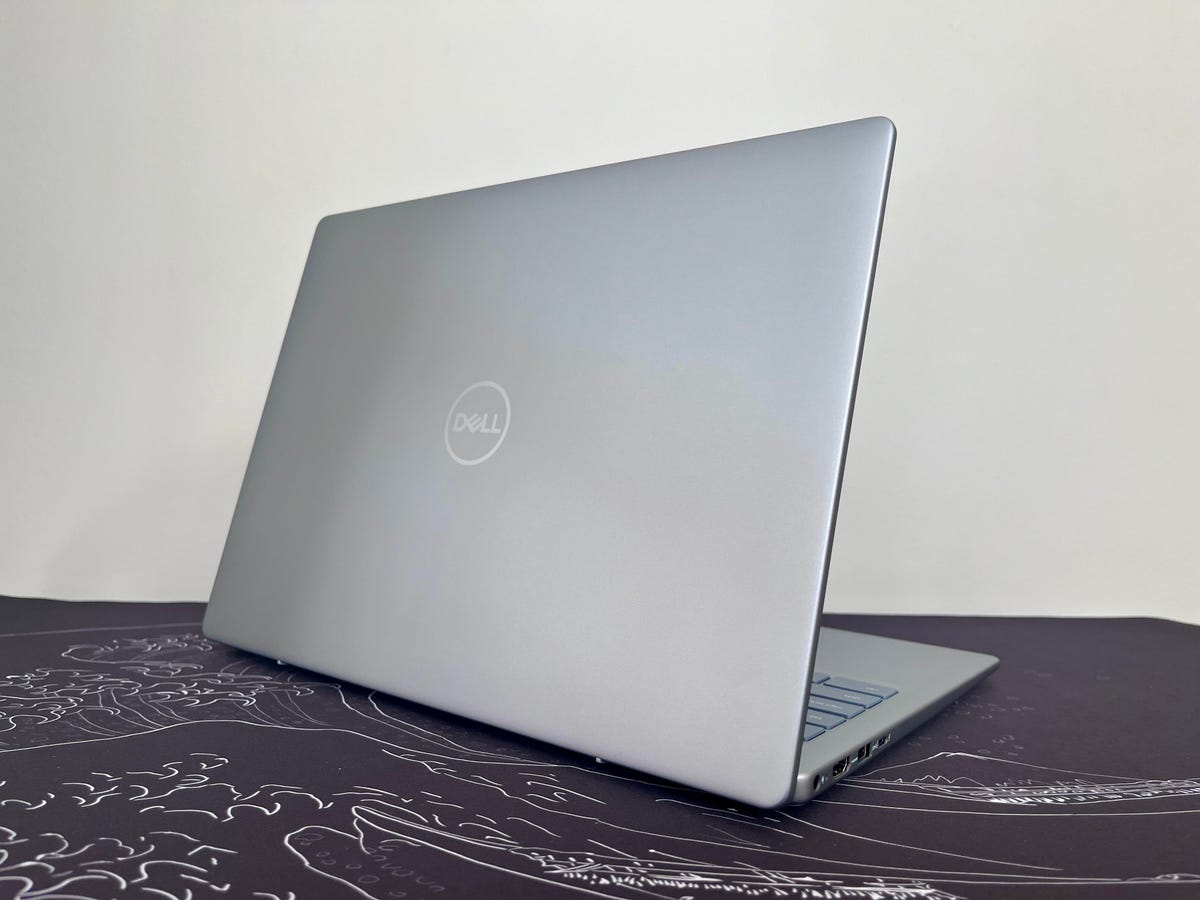 Dell Inspiron 14 Plus 7440 turned to show icy blue top cover