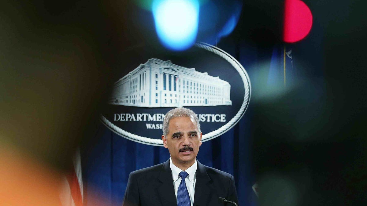 Attorney General Eric Holder and the FBI claim that publication of even aggregate numbers of government requests "is unlawful," Google told a court Tuesday.