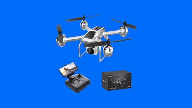 A drone with controller against a blue background