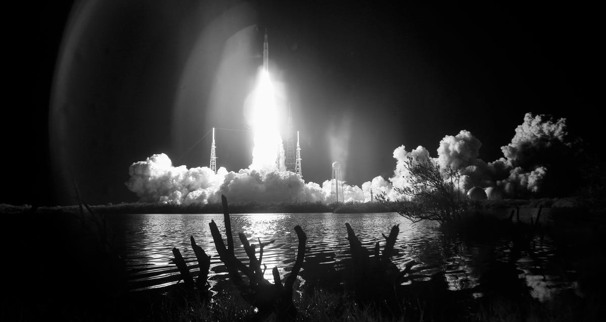 A black and white image of the Artemis I launch.