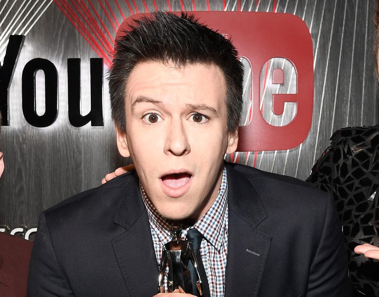 Phil DeFranco arches his eyebrow while looking surprised into the camera