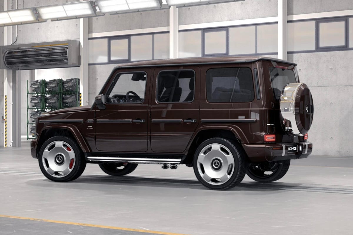 Rear 3/4 view of a brown Mercedes-AMG G63 showing new monoblock wheels