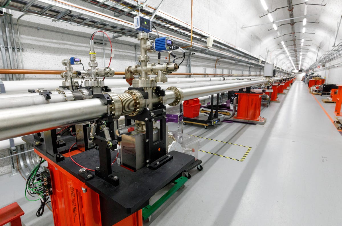 Newer parts of SLAC are built of gleaming metal. This tunnel carries X-rays laser pulses generated by the accelerator to rooms that house the actual experiments.