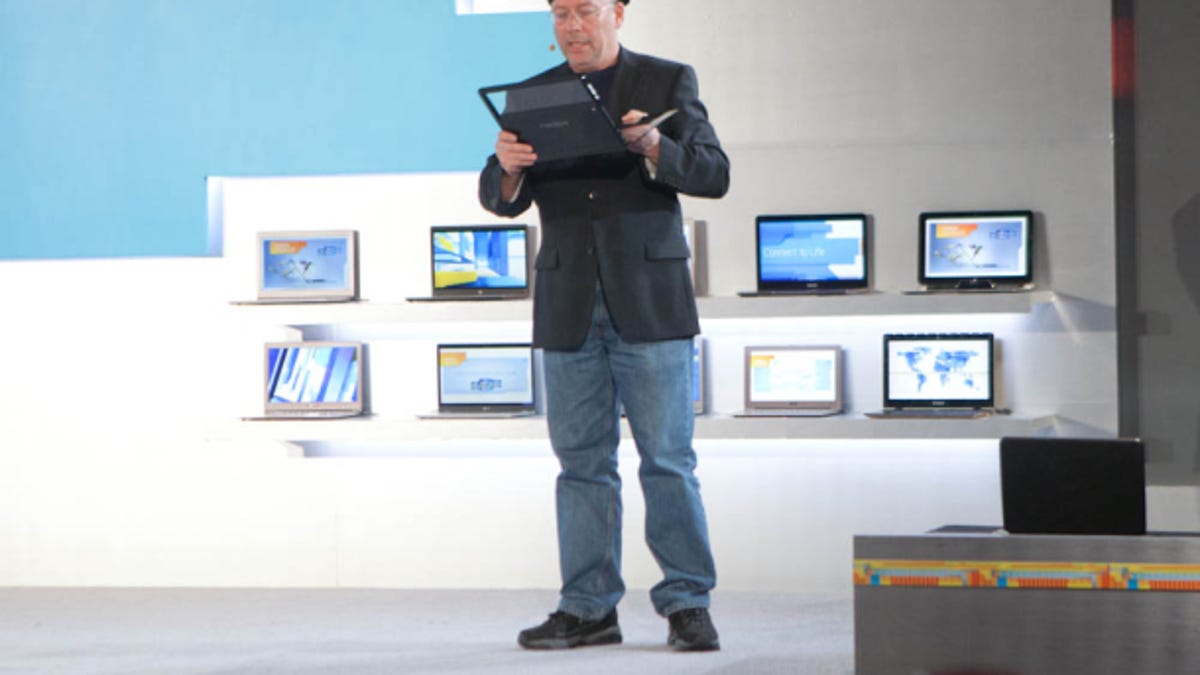Mooly Eden, head of Intel's PC unit, shows off an ultrabook with a transparent touchscreen this year.