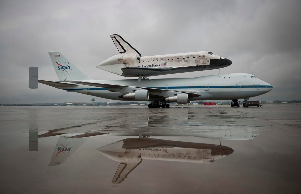 The space shuttle Discovery sits atop a 747 in 2012. 