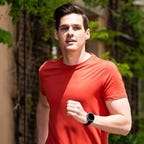 Man running with a Ticwatch clearly visible