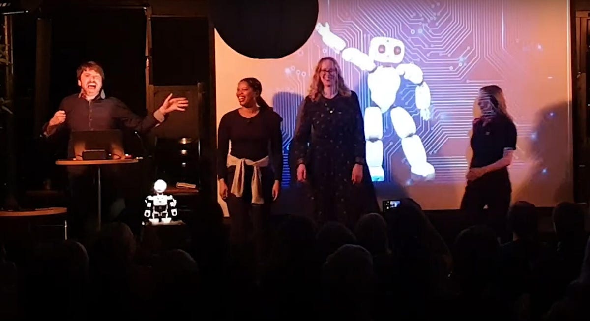 Improv performers with Alex the robot