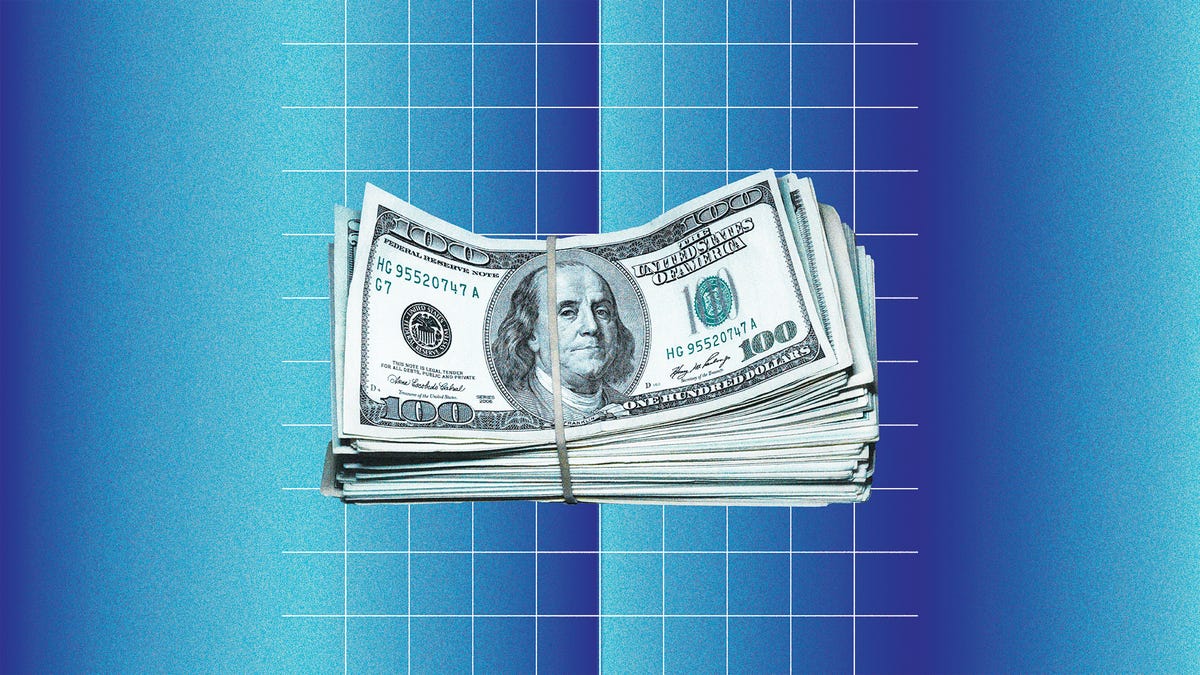 hundred dollar bills on a blue, grid background